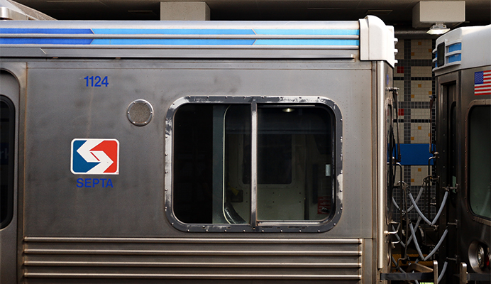 Exterior of metal subway car.