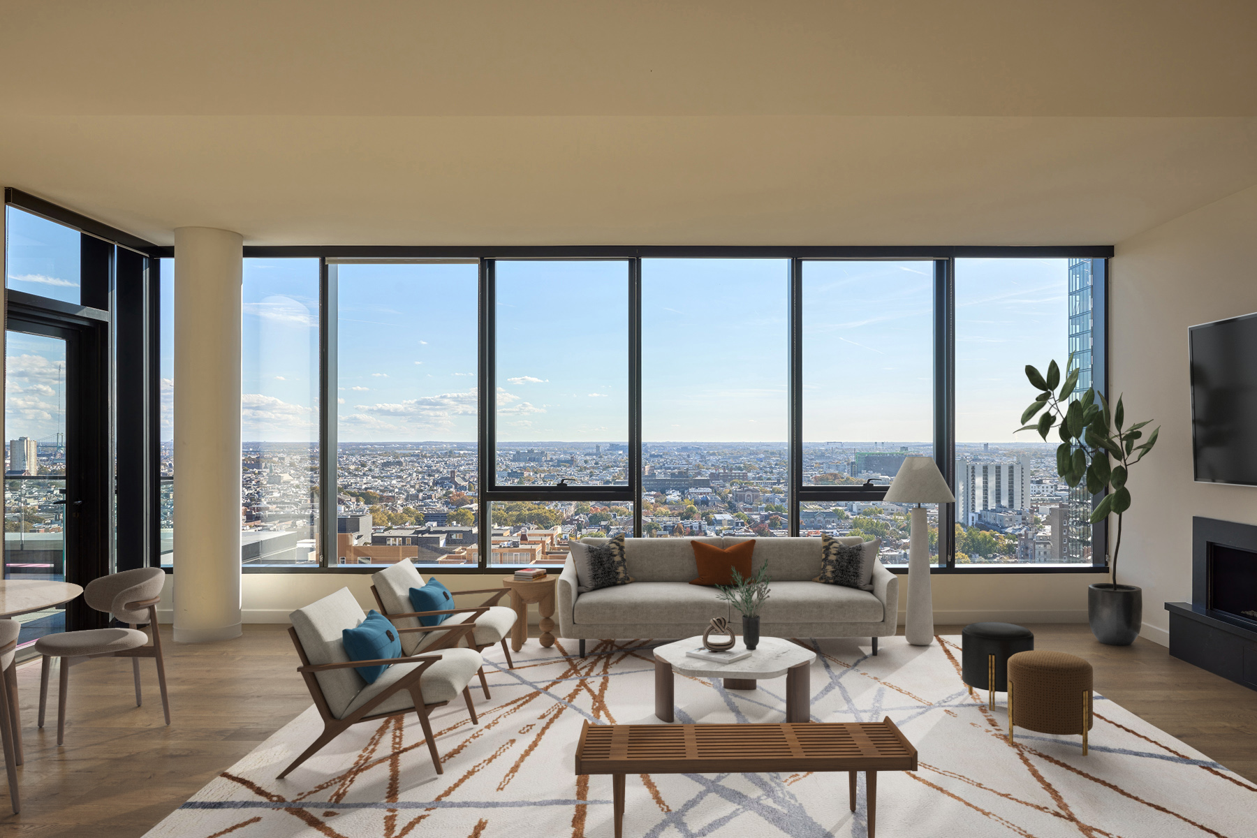 Penthouse living rooms offer ample space and bright floor to ceiling windows.